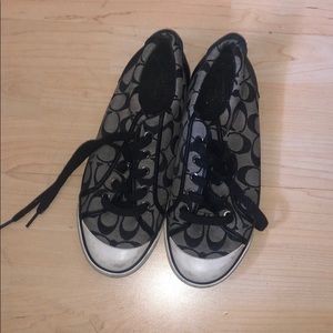 Used coach sneakers in the size 9 1/2 women...